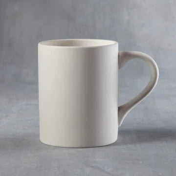 White ceramic mug on a gray background